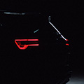 The side silhouette of the SELTOS with taillights on.